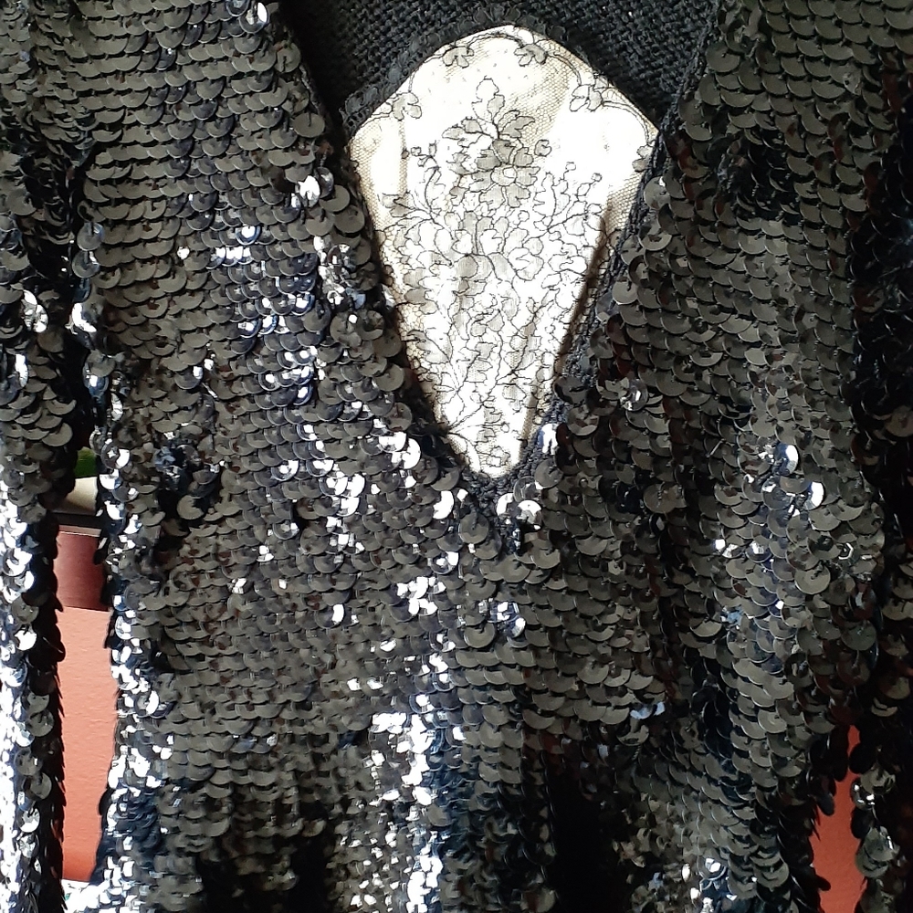 Lovely black sequined top